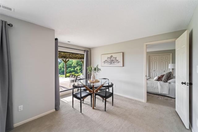 1720 Cedarwood Cir, Clive, IA 50325 - dining area featuring carpet flooring