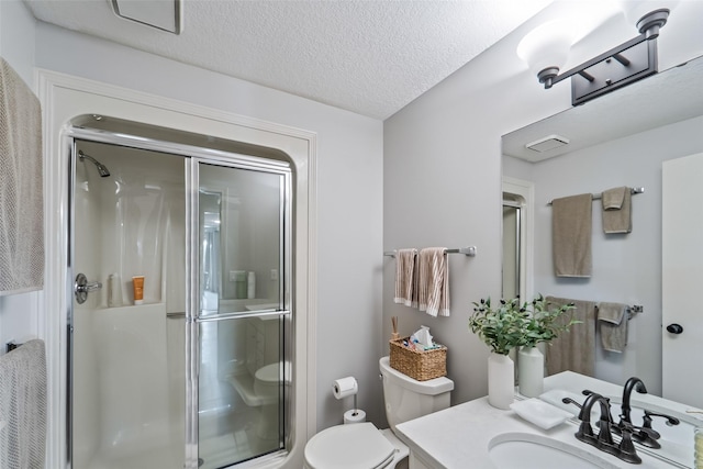 1720 Cedarwood Cir, Clive, IA 50325 - full bath with a shower stall, vanity, and a textured ceiling
