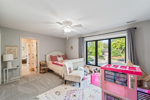 1720 Cedarwood Cir, Clive, IA 50325 - carpeted bedroom featuring access to outside, a ceiling fan, and connected bathroom