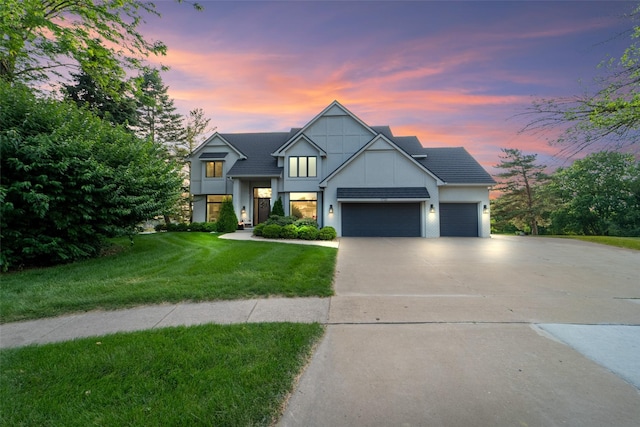 1720 Cedarwood Cir, Clive, IA 50325 - view of front of property featuring a garage, driveway, and a yard