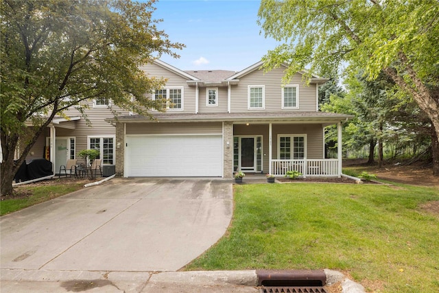 1117 S 52nd St Unit 1705, West Des Moines, IA 50265 - traditional-style home with driveway, a porch, a front lawn, a garage, and roof with shingles