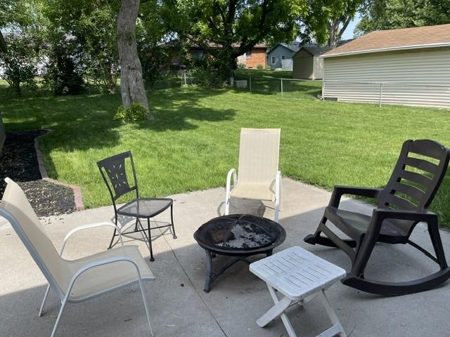 316 NW Linden St, Ankeny, IA 50023 - view of patio / terrace with an outdoor fire pit