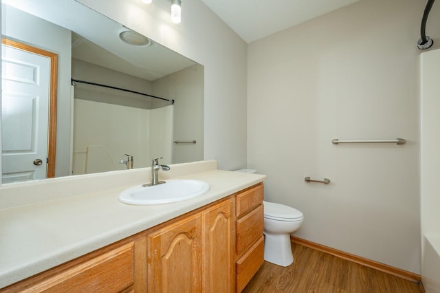 117 4th St NW, Altoona, IA 50009 - full bath featuring wood finished floors and vanity