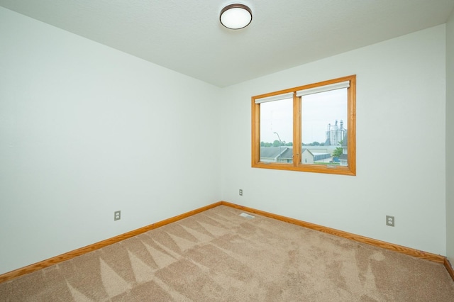 117 4th St NW, Altoona, IA 50009 - unfurnished room featuring light colored carpet