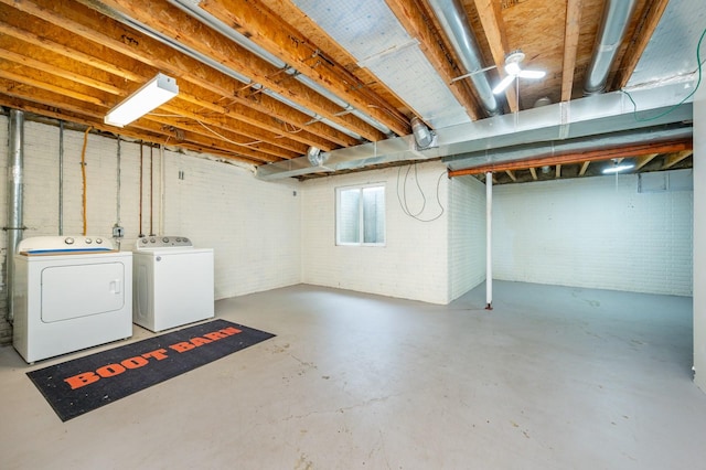 117 4th St NW, Altoona, IA 50009 - below grade area with washer and dryer and brick wall
