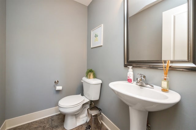 3600 SE Glenstone Dr Unit 308, Grimes, IA 50111 - half bath with baseboards and tile patterned floors