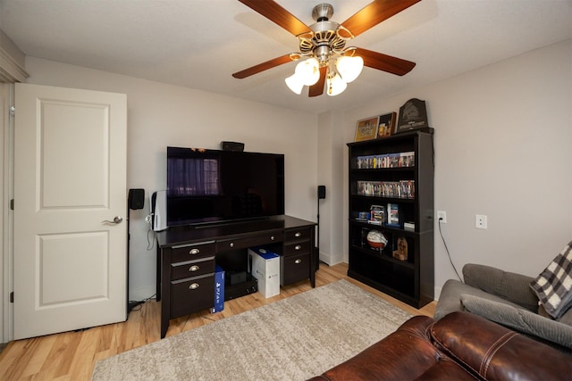 3600 SE Glenstone Dr Unit 308, Grimes, IA 50111 - living area featuring ceiling fan and light wood-style floors