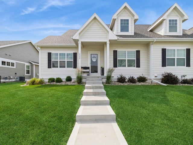 2206 SW Westwood St, Ankeny, IA 50023 - view of front of home with a front yard and roof with shingles