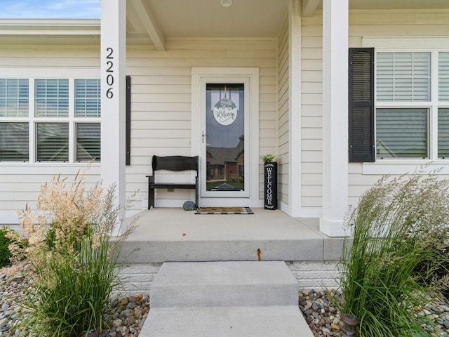 2206 SW Westwood St, Ankeny, IA 50023 - doorway to property featuring covered porch