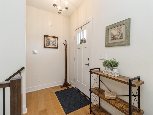 2206 SW Westwood St, Ankeny, IA 50023 - foyer featuring light wood-type flooring and baseboards