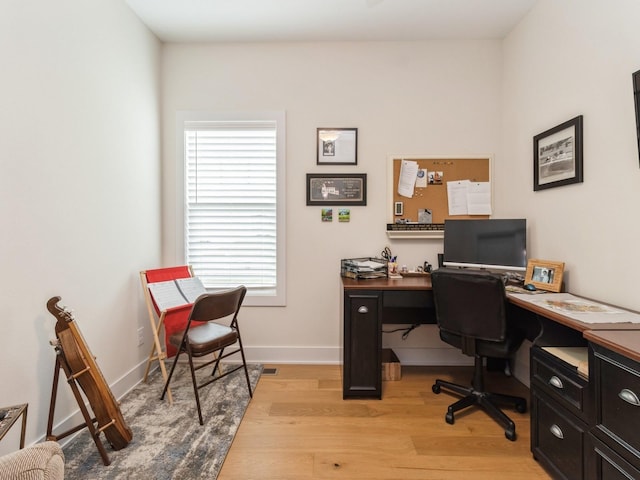 2206 SW Westwood St, Ankeny, IA 50023 - office area with light wood-type flooring and baseboards
