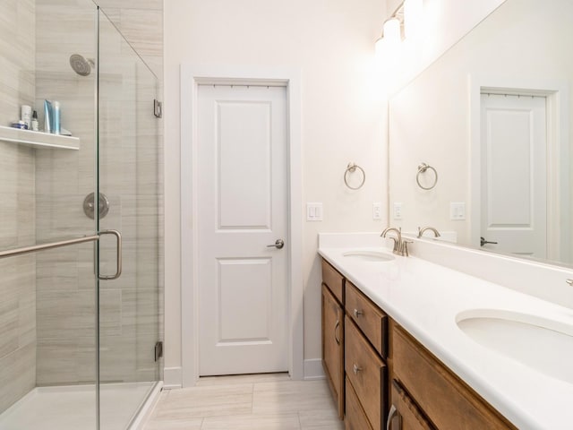 2206 SW Westwood St, Ankeny, IA 50023 - bathroom with double vanity and a shower stall