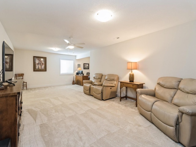 2206 SW Westwood St, Ankeny, IA 50023 - living area featuring light carpet and a ceiling fan