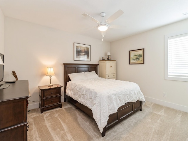 2206 SW Westwood St, Ankeny, IA 50023 - bedroom with light colored carpet and ceiling fan