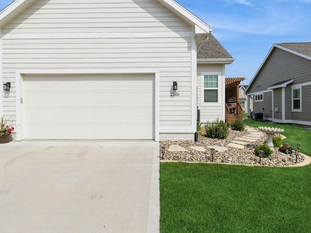 2206 SW Westwood St, Ankeny, IA 50023 - view of front facade featuring driveway, a front yard, a pergola, and a shingled roof
