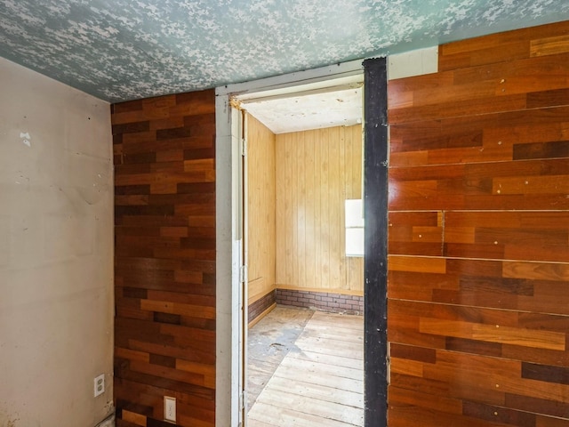1657 Walker St, Des Moines, IA 50316 - hall featuring wood walls