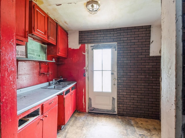 1657 Walker St, Des Moines, IA 50316 - kitchen with unfinished concrete flooring and light countertops