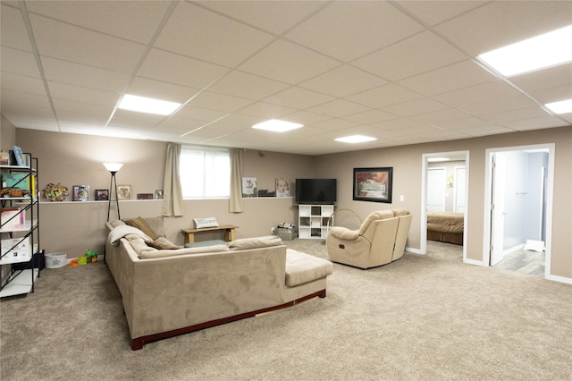 2006 10th St, Eldora, IA 50627 - living room with light colored carpet and a drop ceiling