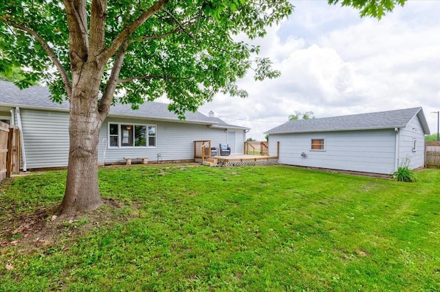 911 E 1st Ave, Indianola, IA 50125 - rear view of house featuring a deck
