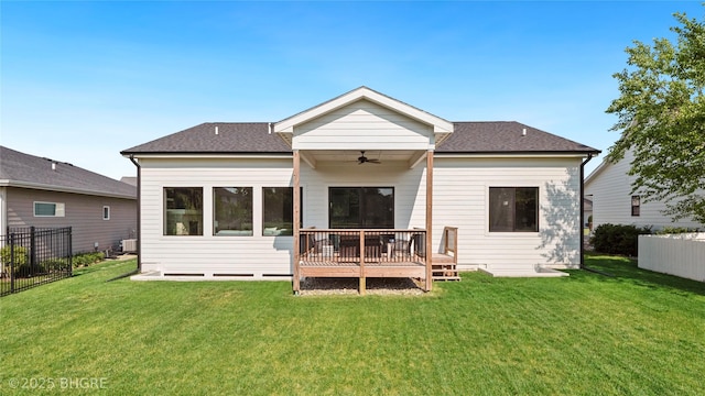 780 NE Badger Ln, Waukee, IA 50263 - back of property with a ceiling fan, a shingled roof, and a deck