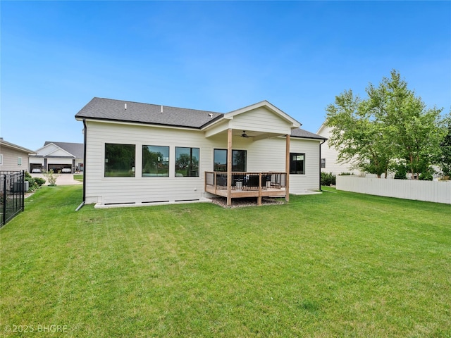 780 NE Badger Ln, Waukee, IA 50263 - back of house with ceiling fan, a wooden deck, and a shingled roof