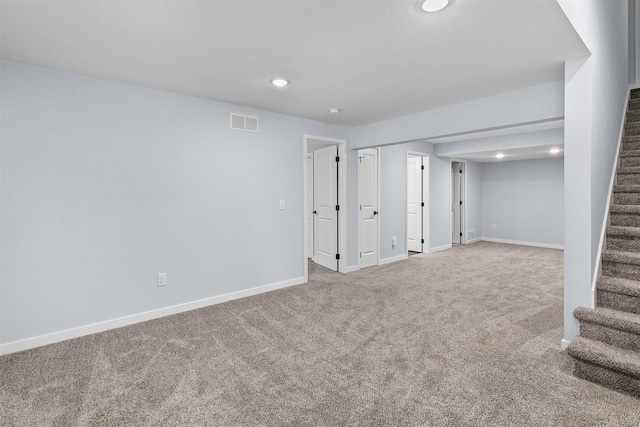 481 10th St, Waukee, IA 50263 - finished below grade area featuring stairway, carpet floors, and recessed lighting