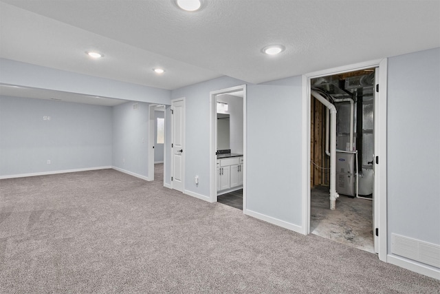 481 10th St, Waukee, IA 50263 - finished basement featuring carpet floors, recessed lighting, and a textured ceiling
