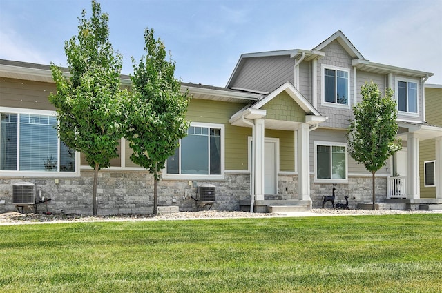 481 10th St, Waukee, IA 50263 - craftsman-style house with a front lawn and stone siding