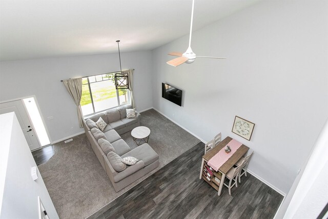 481 10th St, Waukee, IA 50263 - living room with lofted ceiling, ceiling fan, and wood finished floors