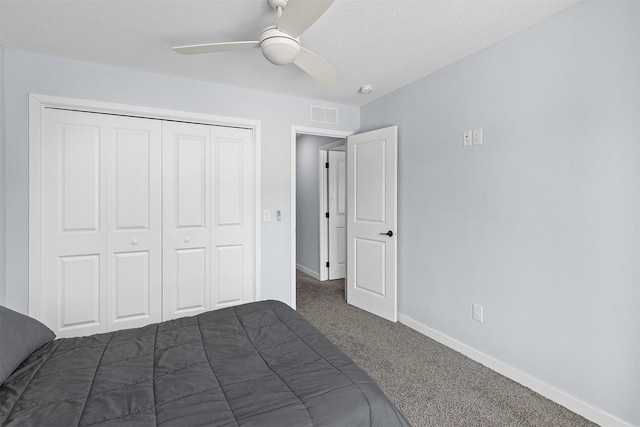 481 10th St, Waukee, IA 50263 - unfurnished bedroom featuring carpet, a closet, and ceiling fan