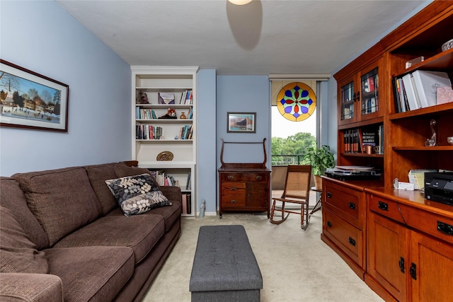 3663 Grand Ave Unit 604, Des Moines, IA 50312 - living area with an office area, light carpet, and built in features