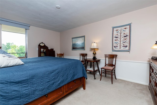 3663 Grand Ave Unit 604, Des Moines, IA 50312 - bedroom featuring light colored carpet and baseboards