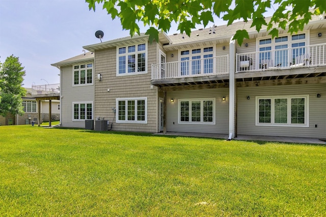 14186 Pinnacle Pointe Dr Unit 86, Clive, IA 50325 - rear view of property with a yard