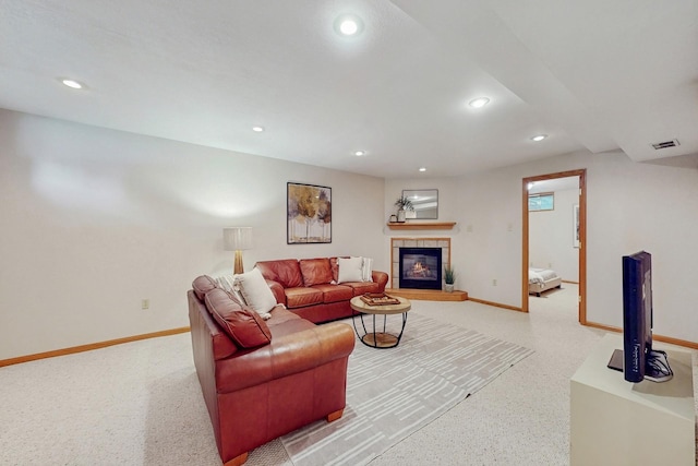 4855 Coachlight Dr, West Des Moines, IA 50265 - living room with recessed lighting and a tiled fireplace