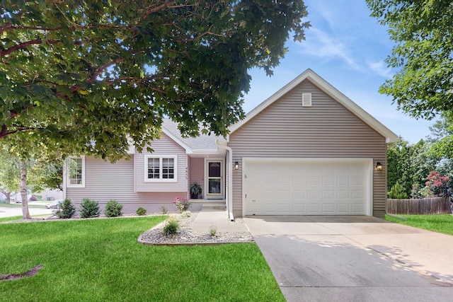 4855 Coachlight Dr, West Des Moines, IA 50265 - ranch-style house featuring an attached garage and driveway