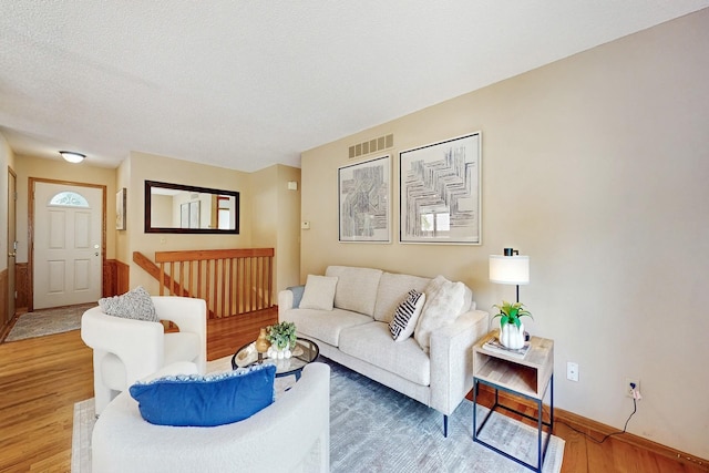 4855 Coachlight Dr, West Des Moines, IA 50265 - living area featuring light wood finished floors and baseboards