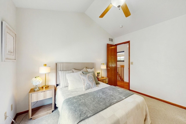 4855 Coachlight Dr, West Des Moines, IA 50265 - carpeted bedroom with vaulted ceiling and a ceiling fan