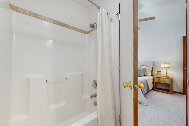 4855 Coachlight Dr, West Des Moines, IA 50265 - ensuite bathroom featuring shower / tub combo with curtain