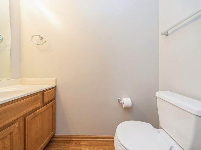 1155 NE 7th Ln, Ankeny, IA 50021 - bathroom featuring vanity and wood finished floors