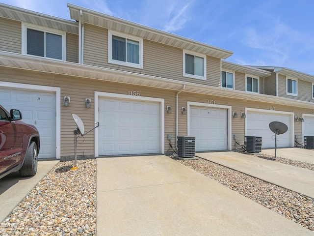 1155 NE 7th Ln, Ankeny, IA 50021 - view of property featuring an attached garage and driveway