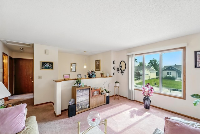 2434 SE 18th Ct, Des Moines, IA 50320 - carpeted living area with baseboards