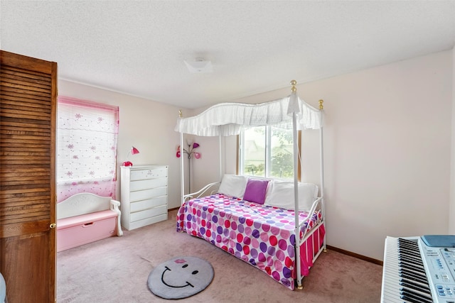 2434 SE 18th Ct, Des Moines, IA 50320 - bedroom with carpet and a textured ceiling