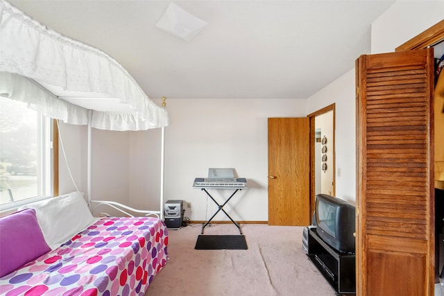 2434 SE 18th Ct, Des Moines, IA 50320 - carpeted bedroom with baseboards