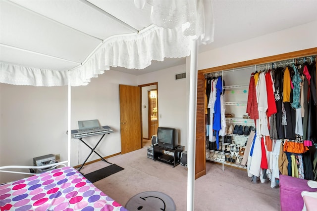 2434 SE 18th Ct, Des Moines, IA 50320 - bedroom featuring carpet and a closet