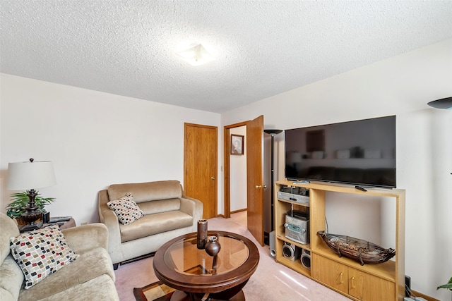 2434 SE 18th Ct, Des Moines, IA 50320 - living area featuring a textured ceiling and light colored carpet
