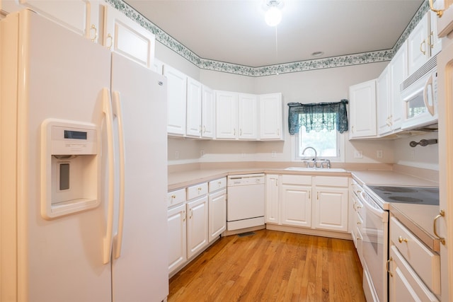 1422 SE Waywin Dr, Ankeny, IA 50021 - kitchen featuring white appliances, white cabinetry, light wood-type flooring, and light countertops