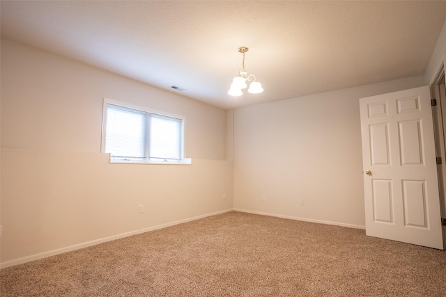 1422 SE Waywin Dr, Ankeny, IA 50021 - empty room featuring carpet flooring and a chandelier