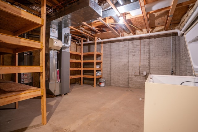 1422 SE Waywin Dr, Ankeny, IA 50021 - unfinished below grade area with heating unit and brick wall
