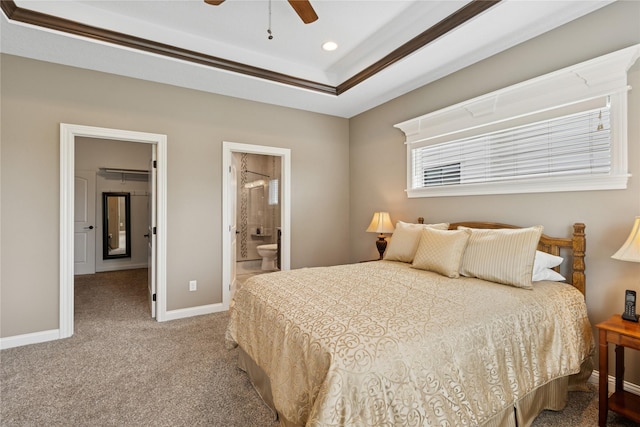 800 NE Badger Ln, Waukee, IA 50263 - carpeted bedroom with ensuite bath, recessed lighting, a ceiling fan, and a tray ceiling