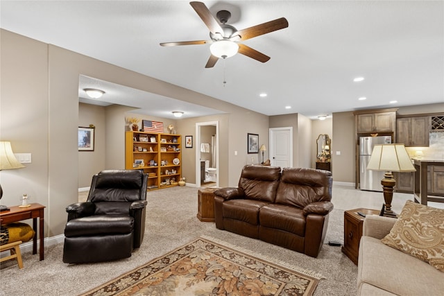 800 NE Badger Ln, Waukee, IA 50263 - living area featuring a ceiling fan, light carpet, and recessed lighting